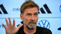 Klopp starts Germany reign by threatening to quit cover