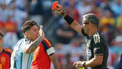 Fernandez defends Argentina as Messi questions remain cover